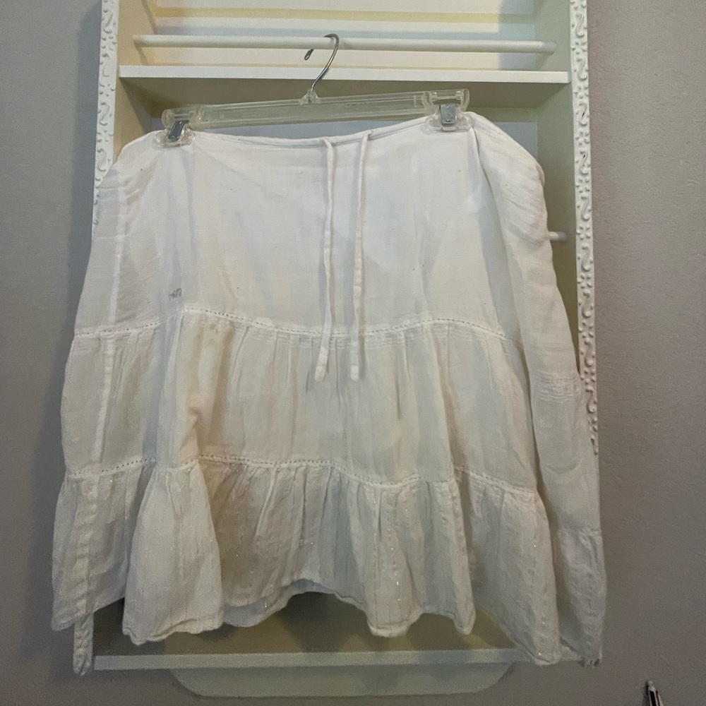 white skirt with silver detailing